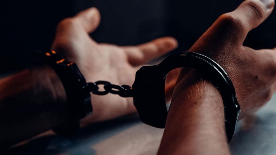 Criminal defence lawyer adelaide - arrested in handcuffs